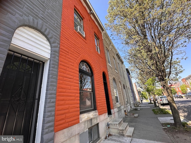 view of property exterior with entry steps