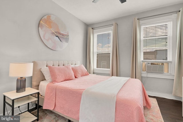 102 N Glover St, Baltimore, MD 21224 - bedroom featuring dark wood finished floors, ceiling fan, and cooling unit