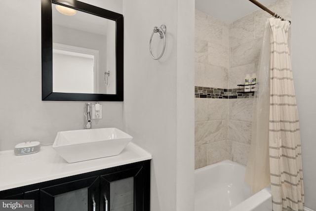 102 N Glover St, Baltimore, MD 21224 - bathroom featuring shower / bath combo with shower curtain and vanity
