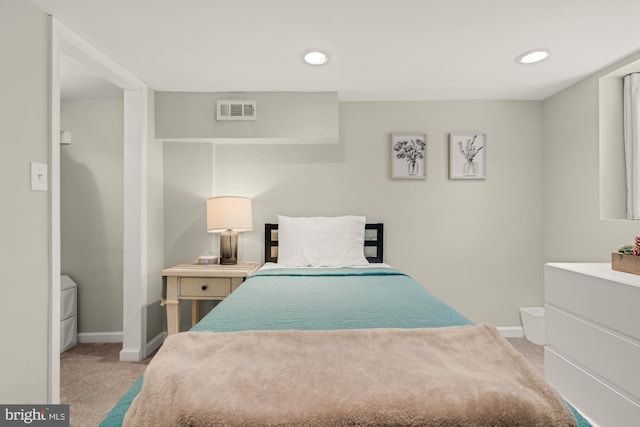 102 N Glover St, Baltimore, MD 21224 - bedroom with baseboards, recessed lighting, visible vents, and light carpet