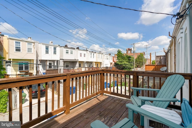 102 N Glover St, Baltimore, MD 21224 - wooden deck featuring a residential view