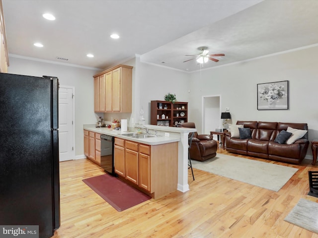 103 Potters Cir, Strasburg, VA 22657 - kitchen with black appliances, a sink, a peninsula, open floor plan, and crown molding
