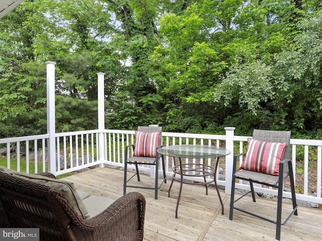 103 Potters Cir, Strasburg, VA 22657 - wooden deck featuring view of wooded area