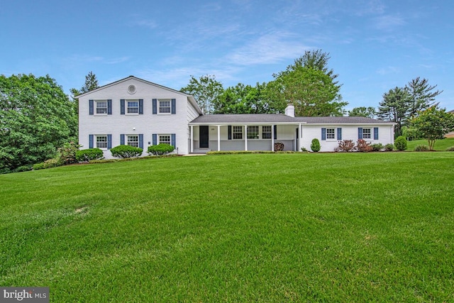 205 Dunbeath Ct, Lutherville Timonium, MD 21093 - view of front of property with a front lawn and a chimney