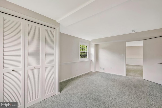 205 Dunbeath Ct, Lutherville Timonium, MD 21093 - unfurnished bedroom with a closet, carpet floors, baseboards, and vaulted ceiling