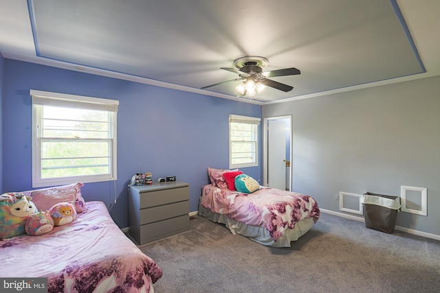 bedroom featuring baseboards, ceiling fan, and carpet flooring