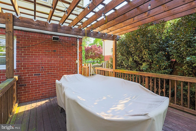 deck featuring a pergola