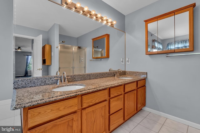12 Jon Dr, Barnegat, NJ 08005 - bathroom featuring double vanity, tile patterned flooring, a shower stall, and a sink