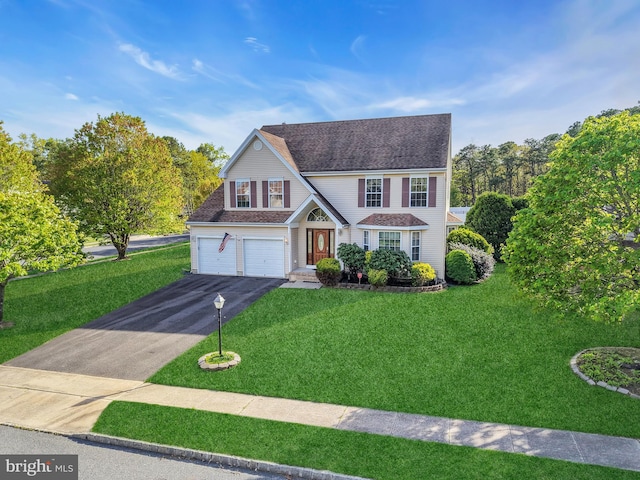 12 Jon Dr, Barnegat, NJ 08005 - traditional home featuring a front lawn, roof with shingles, aphalt driveway, and a garage