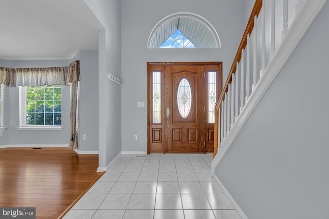 12 Jon Dr, Barnegat, NJ 08005 - entryway with stairs, baseboards, a healthy amount of sunlight, and wood finished floors