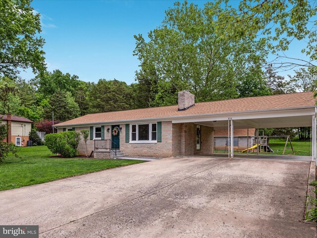 850 Virginia Cir, Strasburg, VA 22657 - ranch-style home with a chimney, a front yard, concrete driveway, brick siding, and an attached carport