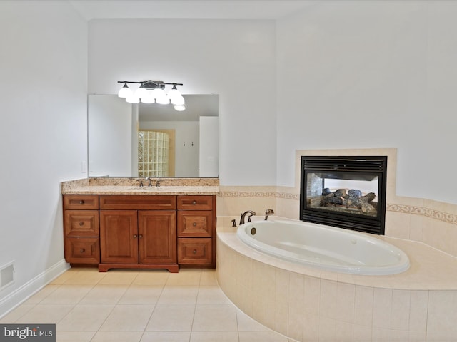 191 Inez Ln, Stephens City, VA 22655 - bathroom with vanity, tile patterned floors, a glass covered fireplace, and a bath