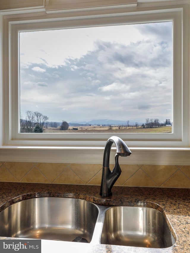 191 Inez Ln, Stephens City, VA 22655 - interior details with a sink, backsplash, and dark stone countertops