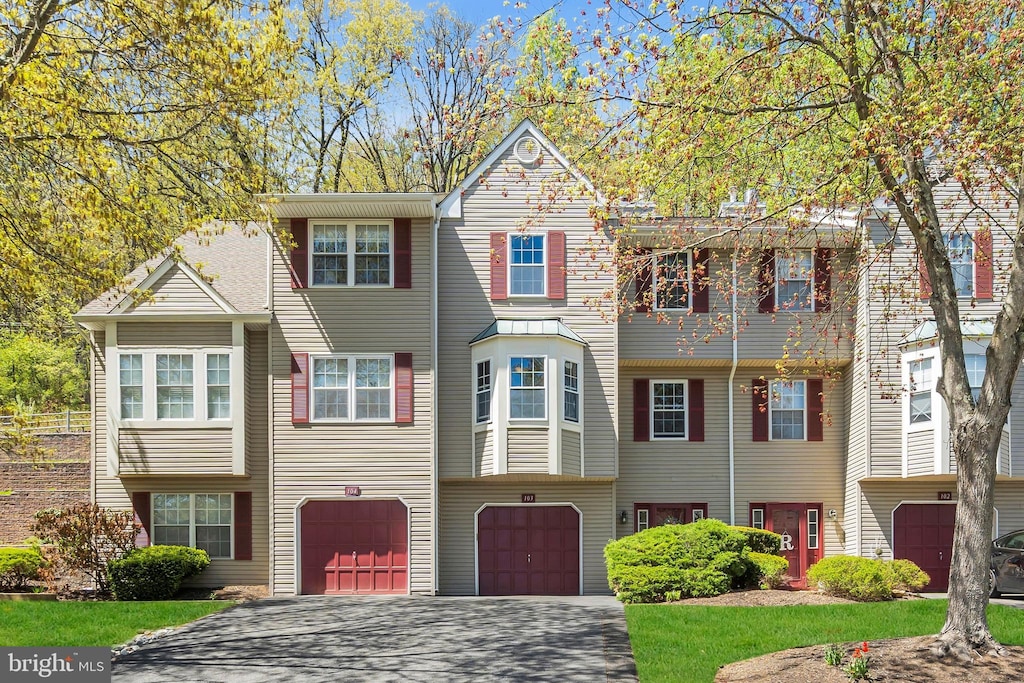 103 Pinehurst Dr, Washington, NJ 07882 - townhome / multi-family property with a garage and driveway