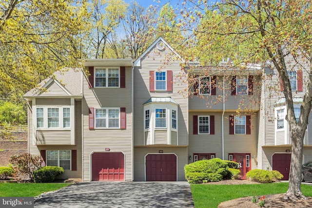 103 Pinehurst Dr, Washington, NJ 07882 - townhome / multi-family property with a garage and driveway