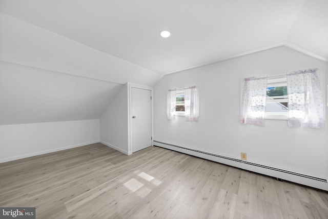 1504 Montgomery Rd, Wilmington, DE 19805 - additional living space featuring wood finished floors, baseboards, baseboard heating, recessed lighting, and vaulted ceiling