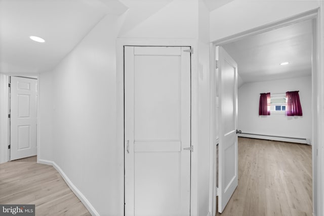 1504 Montgomery Rd, Wilmington, DE 19805 - corridor featuring baseboards, recessed lighting, light wood-style flooring, and a baseboard heating unit