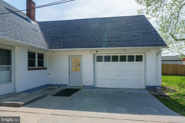 1504 Montgomery Rd, Wilmington, DE 19805 - view of front of property with roof with shingles, fence, an attached garage, and a chimney