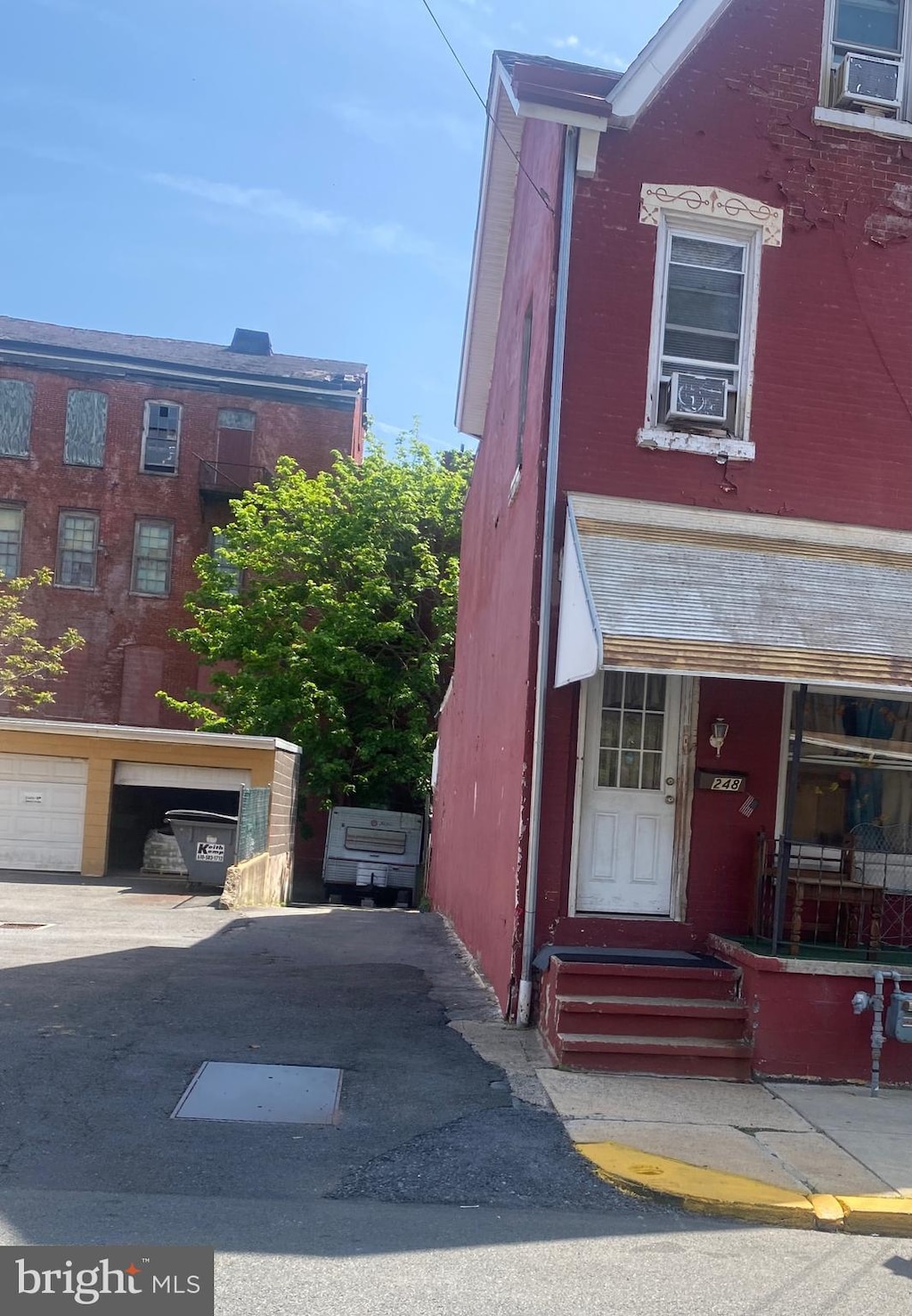 248 Greenwich St, Reading, PA 19601 - view of front facade featuring brick siding