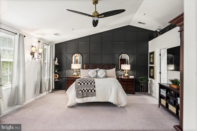 bedroom featuring baseboards, vaulted ceiling, carpet floors, and visible vents