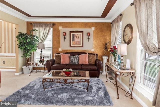 living room featuring carpet floors, baseboards, crown molding, and wallpapered walls