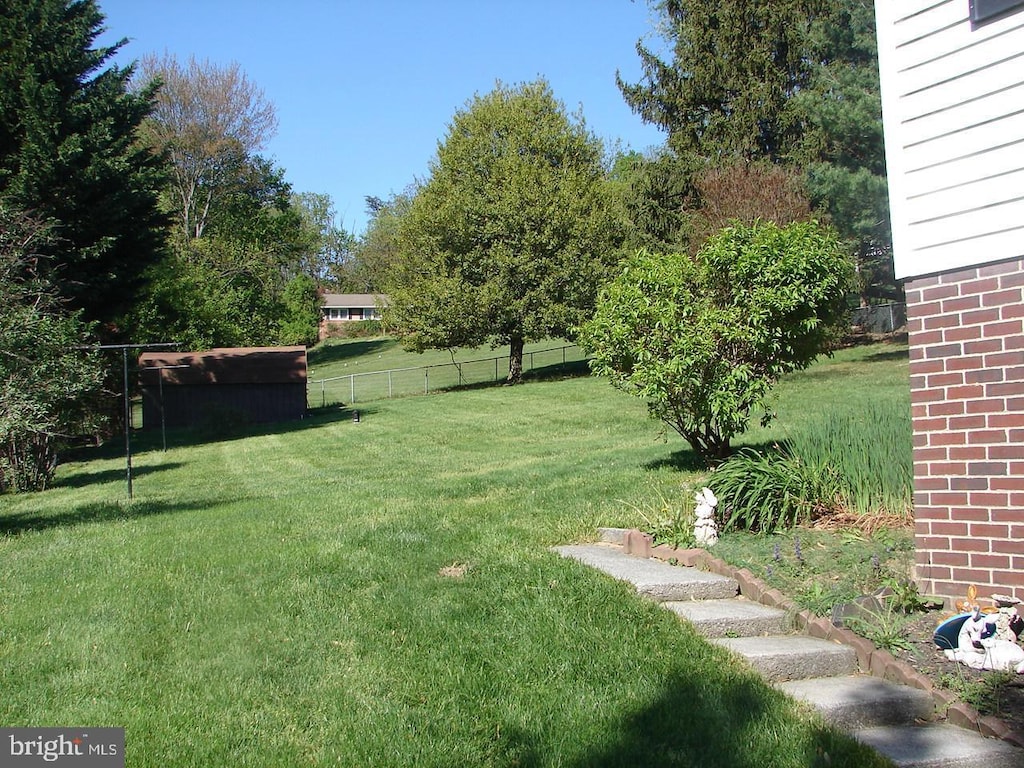 view of yard featuring fence