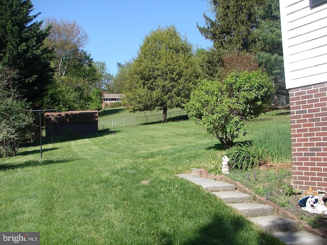view of yard featuring fence