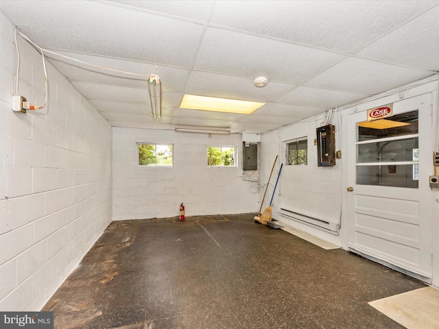 9618 Hall Rd, Frederick, MD 21701 - garage with a baseboard radiator, concrete block wall, and electric panel