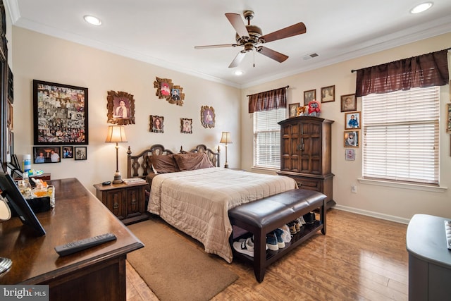 bedroom featuring visible vents, crown molding, baseboards, light wood-style floors, and recessed lighting