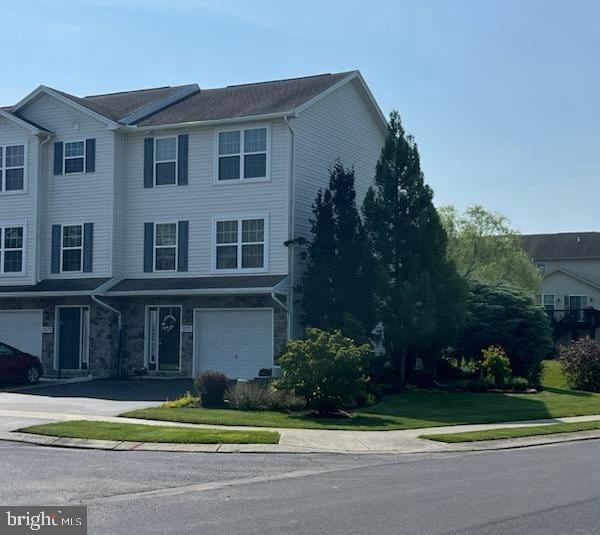 3570 Pinecrest Ct, Fayetteville, PA 17222 - view of front of home with asphalt driveway, an attached garage, and a front yard