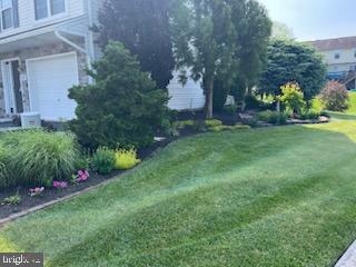 3570 Pinecrest Ct, Fayetteville, PA 17222 - view of grassy yard featuring a garage