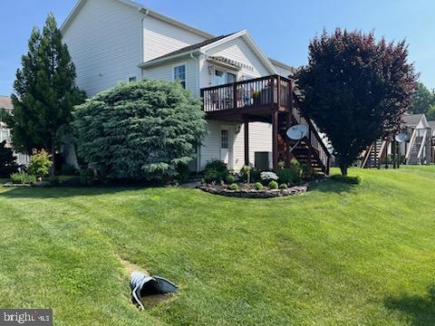3570 Pinecrest Ct, Fayetteville, PA 17222 - view of green lawn featuring stairway and a deck