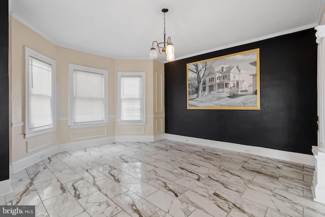 unfurnished dining area with baseboards, ornamental molding, marble finish floor, and a chandelier