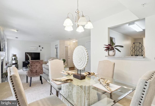 dining room featuring carpet floors, baseboards, a chandelier, and radiator