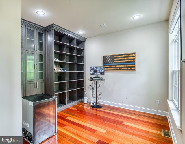 7140 Barry Rd, Alexandria, VA 22315 - unfurnished office featuring wood finished floors, baseboards, and recessed lighting