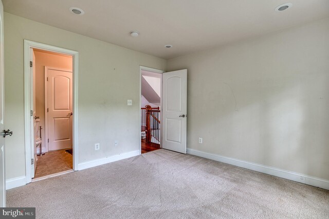 7140 Barry Rd, Alexandria, VA 22315 - unfurnished bedroom with carpet floors and baseboards