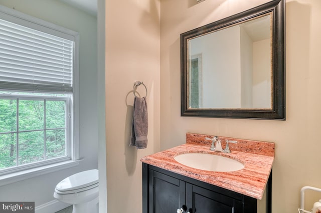 7140 Barry Rd, Alexandria, VA 22315 - half bath with toilet, vanity, and baseboards