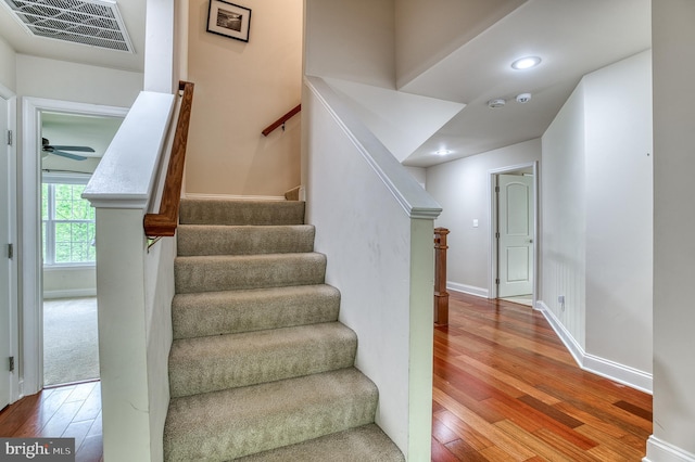 7140 Barry Rd, Alexandria, VA 22315 - stairway featuring hardwood / wood-style floors, baseboards, recessed lighting, and ceiling fan