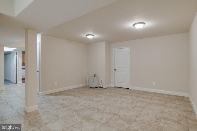 7140 Barry Rd, Alexandria, VA 22315 - finished basement with light tile patterned floors and baseboards