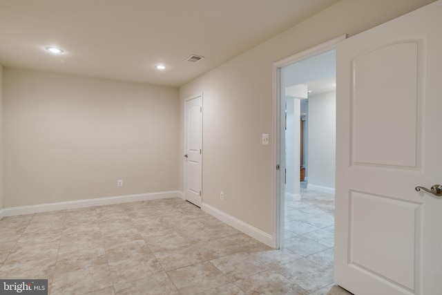 7140 Barry Rd, Alexandria, VA 22315 - empty room featuring recessed lighting, baseboards, and light tile patterned floors