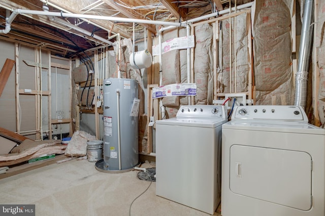 7140 Barry Rd, Alexandria, VA 22315 - clothes washing area with water heater and separate washer and dryer