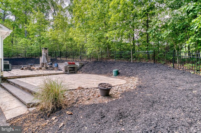 7140 Barry Rd, Alexandria, VA 22315 - view of yard featuring fence and central air condition unit