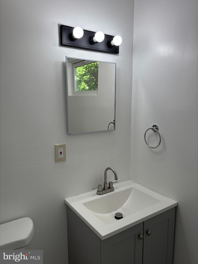 9016 Samoset Rd, Randallstown, MD 21133 - half bath featuring vanity and toilet