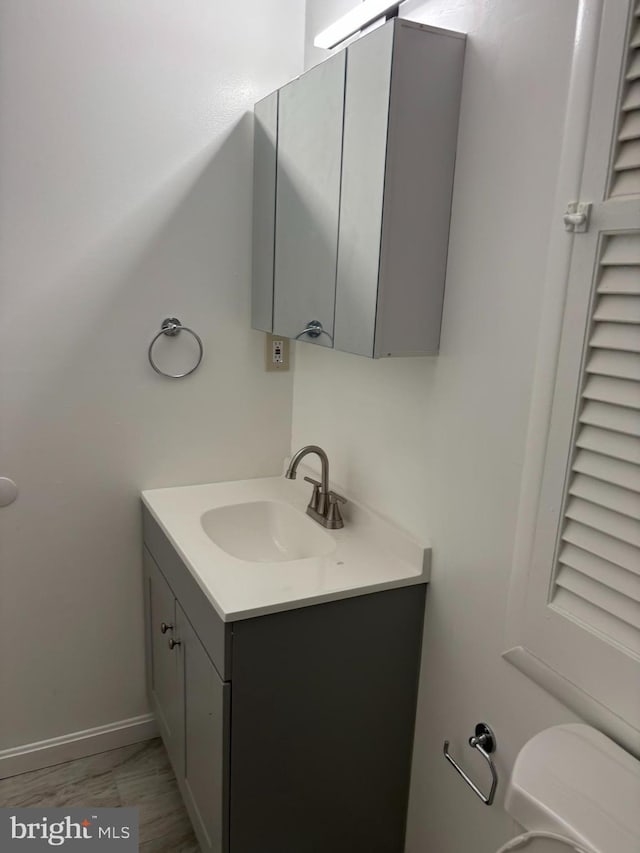 9016 Samoset Rd, Randallstown, MD 21133 - bathroom featuring vanity and toilet
