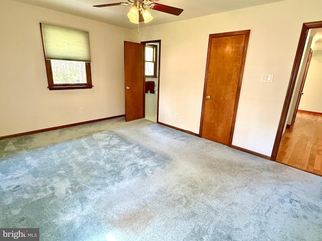 265 Asbury Rd, Egg Harbor Township, NJ 08234 - unfurnished bedroom with baseboards, a ceiling fan, and carpet floors
