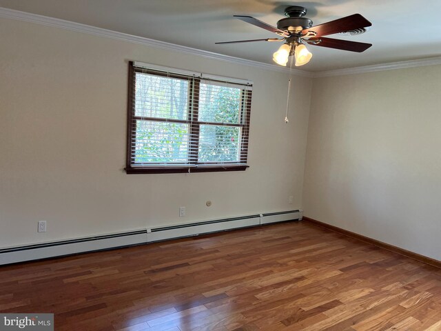 265 Asbury Rd, Egg Harbor Township, NJ 08234 - unfurnished room featuring ceiling fan, a baseboard heating unit, ornamental molding, and wood finished floors