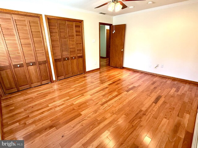 265 Asbury Rd, Egg Harbor Township, NJ 08234 - unfurnished bedroom with visible vents, light wood-style flooring, multiple closets, and baseboards