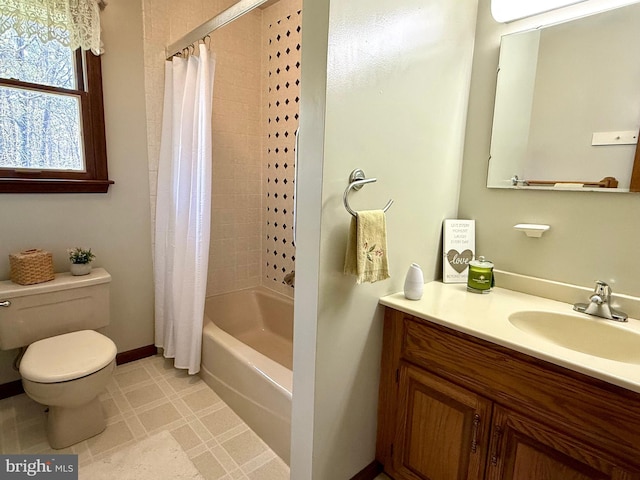 265 Asbury Rd, Egg Harbor Township, NJ 08234 - bathroom featuring vanity, shower / bath combo with shower curtain, toilet, baseboards, and tile patterned floors
