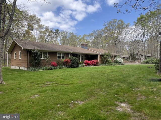 265 Asbury Rd, Egg Harbor Township, NJ 08234 - view of front of house featuring a chimney and a front lawn