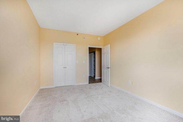 3200 N Leisure World Blvd Unit 1010, Silver Spring, MD 20906 - unfurnished bedroom with carpet flooring, baseboards, and a closet
